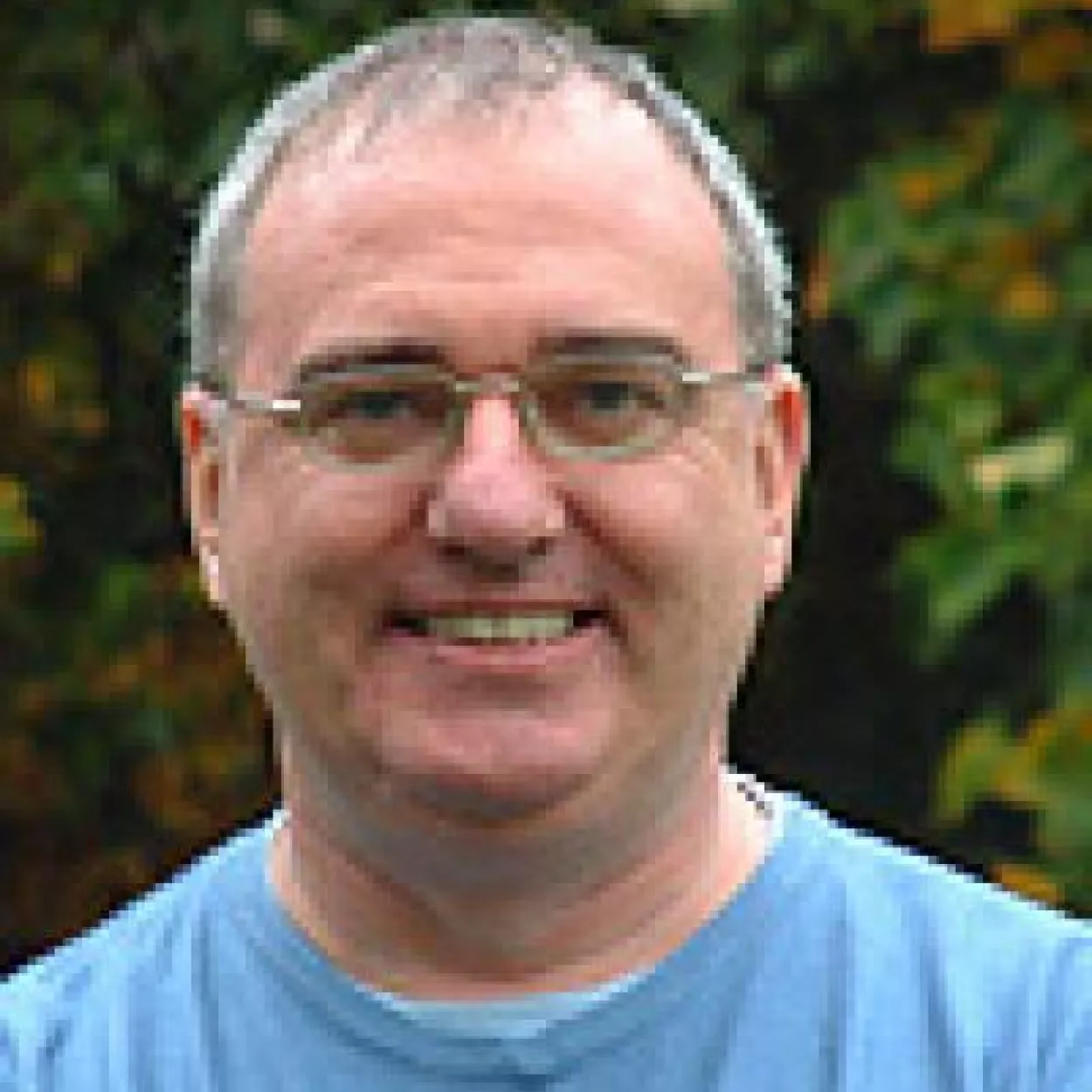 Headshot of professor Dominic	Keown