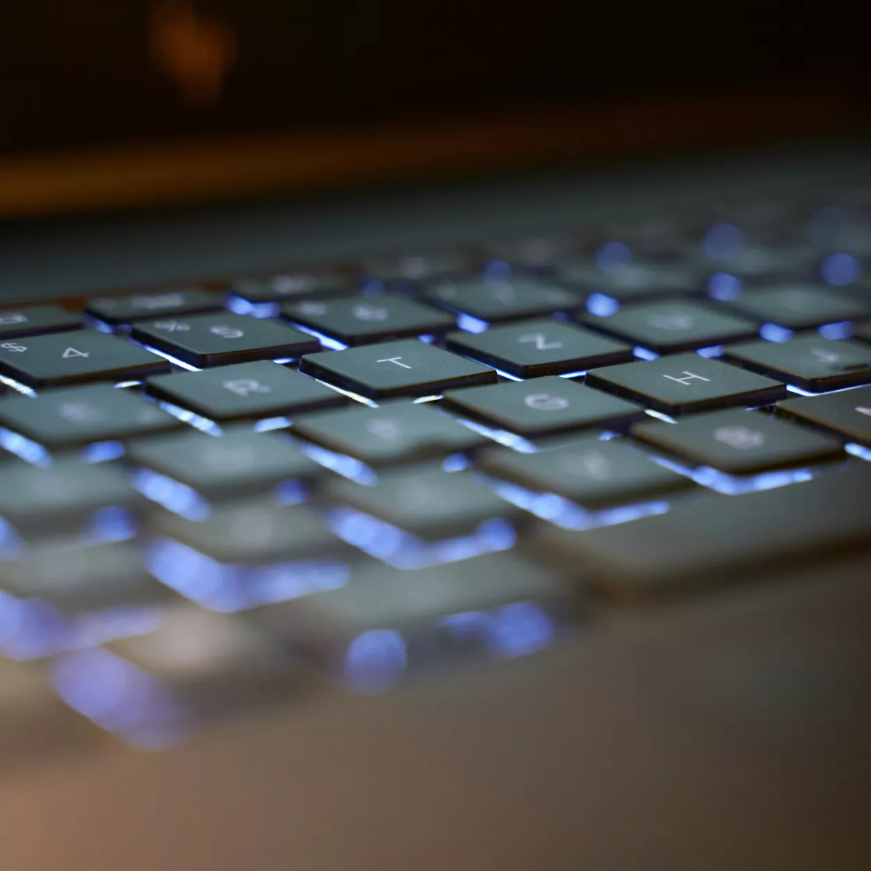 Close up of backlit computer keyboard